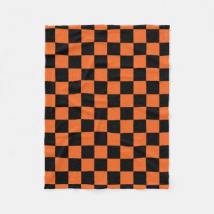 Black and orange chequered pattern fleece blanket
