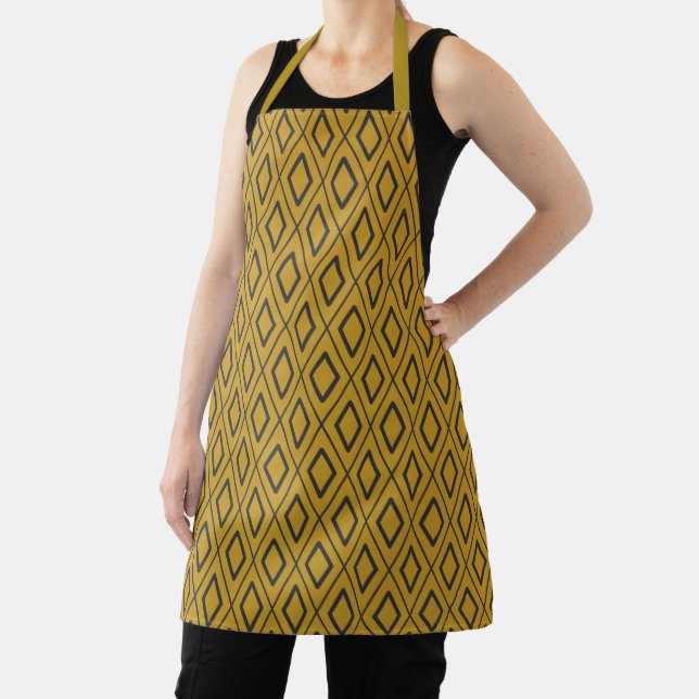 Black and orange dynamic geometric pattern apron (Insitu)