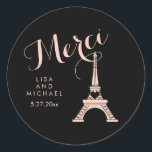 Black and Pink Paris Eiffel Tower Wedding Merci Classic Round Sticker<br><div class="desc">This chic,  stylish stickers feature a blush pink Eiffel Tower with a heart,  and the word "Merci" or thank you in French,  in fancy pink script. The background is black.</div>
