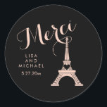 Black and Pink Paris Eiffel Tower Wedding Merci Classic Round Sticker<br><div class="desc">This chic,  stylish stickers feature a blush pink Eiffel Tower with a heart,  and the word "Merci" or thank you in French,  in fancy pink script. The background is black.</div>