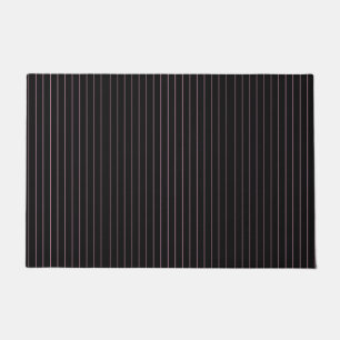 black and pink striped doormat