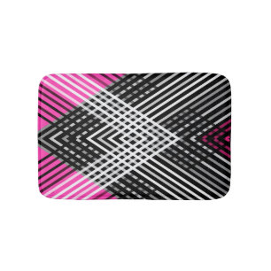 Black and white and grey intertwined stripes on a  bath mat