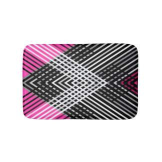 Black and white and grey intertwined stripes on a  bath mat