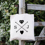 Black and White Arrow Wedding Monogram Tote Bag<br><div class="desc">Cute trendy wedding monogram tote bags with a personalised logo featuring crossed arrows with a cool diamond and heart symbol and the bride and groom's monogram initials. Great for party favours or guest welcome tote bags! Click the "Customise It" button to personalise with your wedding date, names or other custom...</div>