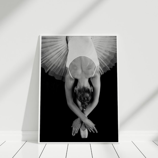 Black and White Ballerina Poster Print (Black and White Ballerina Poster Print in white frame on wooden floor.)