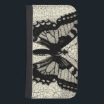 Black and White Butterfly on Cracked Background Samsung S4 Wallet Case<br><div class="desc">A simple black and white butterfly is the focus of this print by Vision Studio. The two-toned insect and the cracked background give the piece a rustic feel. Order your copy today!</div>