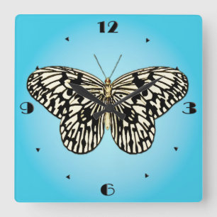 Black and white butterfly on turquoise square wall clock