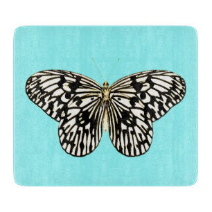 Black and white butterfly, turquoise background cutting board