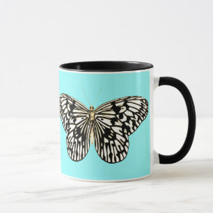 Black and white butterfly, turquoise background mug