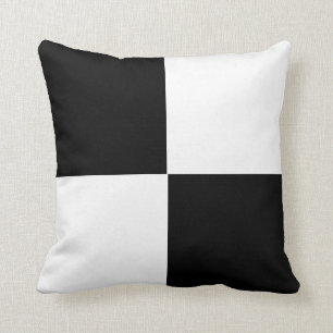 black and white chequered board pattern cushion