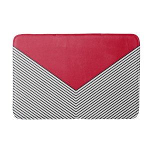 Black and white chevron design and red triangle bath mat