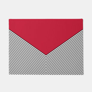 Black and white chevron design and red triangle doormat