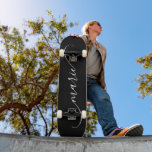 Black and White Classy Curved Swash Signature Name Skateboard<br><div class="desc">Create your own elegant signature style script skateboard for her. Customise the size of the modern classy curved swash handwritten calligraphy script style as needed to fit within the trucks and wheels. If you change the white colour of the script font, make sure to double check the drop shadow colour...</div>