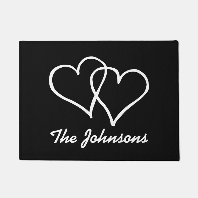 Black and white door mat with interlocked hearts (Front)