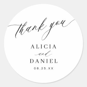 Black and white elegant script wedding thank you classic round sticker