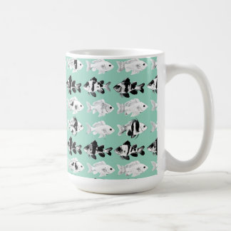 Black and white fish on teal background coffee mug