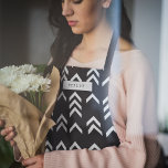 Black and White Geometric Chevron Pattern Apron<br><div class="desc">Simple,  stylish,  trendy holiday design with a typewriter style typography font with your custom name over a black and white geometric chevron pattern. The perfect gift or accessory!</div>