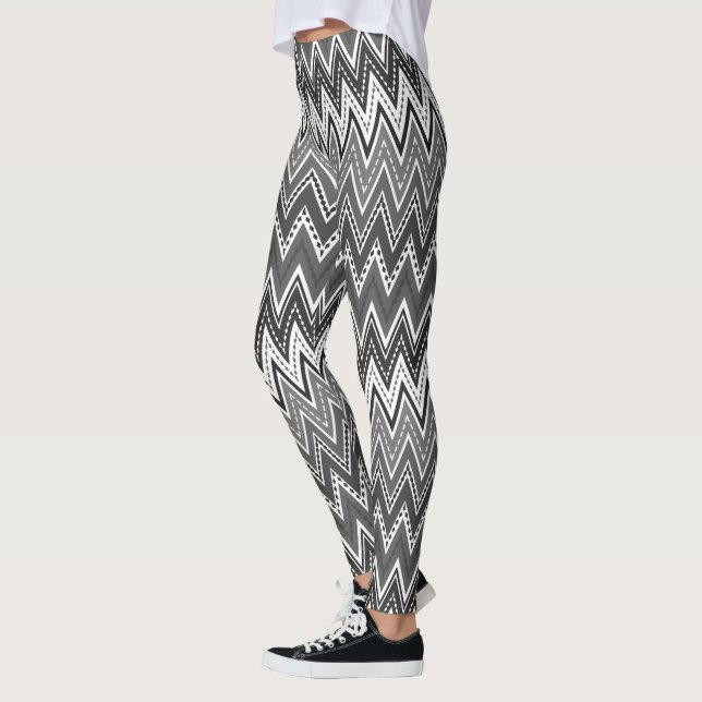 Black and white geometric zigzag pattern leggings (Left)