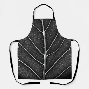 Black and white glowing leaf close-up apron