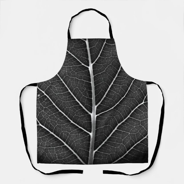 Black and white glowing leaf close-up apron (Front)
