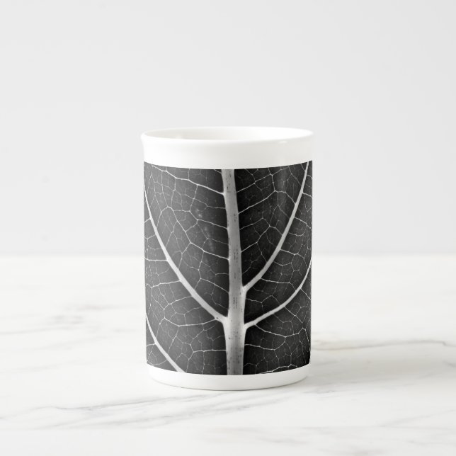 Black and white glowing leaf close-up bone china mug (Front)