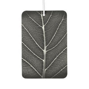 Black and white glowing leaf close-up car air freshener