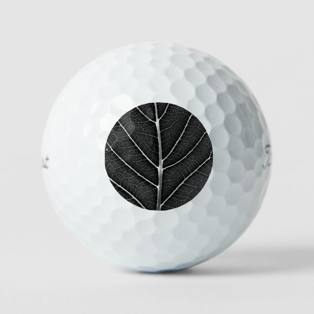 Black and white glowing leaf close-up golf balls (Front)