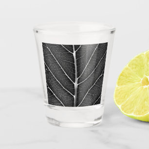 Black and white glowing leaf close-up shot glass
