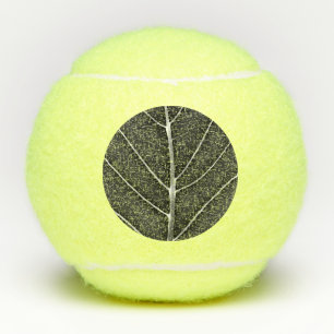 Black and white glowing leaf close-up tennis balls