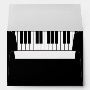 Black and white grand piano keys lined envelopes