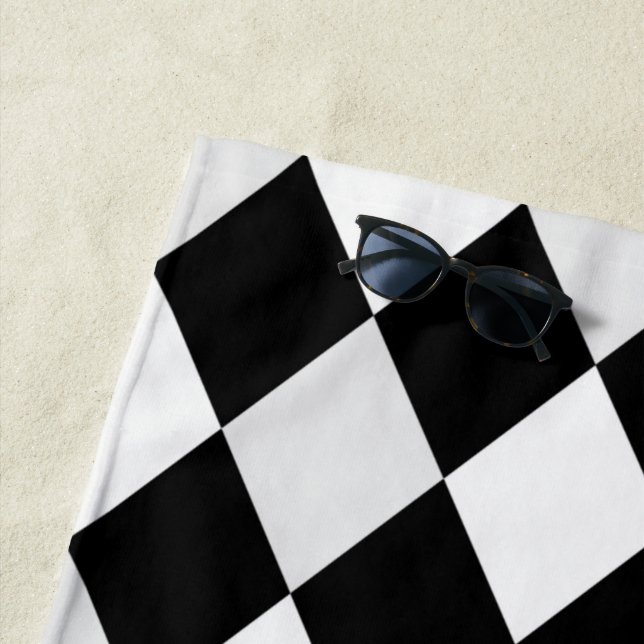 Black and White Harlequin Diamond Pattern Beach Towel (In Situ)