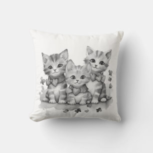 Black and white kittens cushion