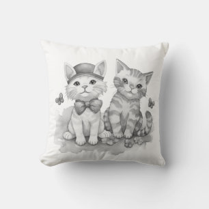 Black and white kittens cushion