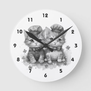 Black and white kittens with bow tie and cute hats round clock