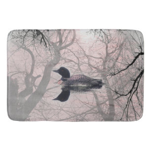 Black and white loon on a lake  Bathroom mat pink