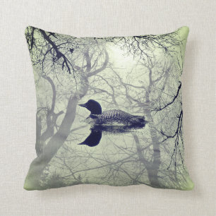 Black and white loon on a lake decor pillow