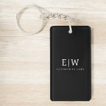 Black and White Minimalist Modern Monogram Key Ring<br><div class="desc">Introducing our Black and White Minimalist Modern Monogram Collection: Embrace simplicity and sophistication with our minimalist designs, curated to elevate your style effortlessly. Crafted with a keen eye for modern aesthetics, this collection features sleek black and white designs accentuated by personalised monograms. From chic stationery to versatile accessories, our collection...</div>