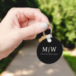 Black and White Minimalist Modern Monogram Key Ring<br><div class="desc">Introducing our Black and White Minimalist Modern Monogram Collection: Embrace simplicity and sophistication with our minimalist designs, curated to elevate your style effortlessly. Crafted with a keen eye for modern aesthetics, this collection features sleek black and white designs accentuated by personalised monograms. From chic stationery to versatile accessories, our collection...</div>