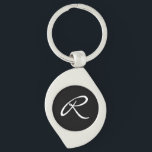 Black and White Monogram Key Ring<br><div class="desc">Simple and chic, this design features a white monogram over a black background. It makes a great personalised gift. Edit the monogram with your initial. You can adjust the font and re-centre it to suit your monogram by using the "Customise It" feature. You can also change the black background to...</div>