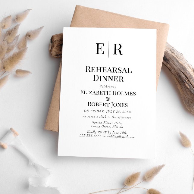 Black and White Monogram Rehearsal Dinner Invitation (Black and White Monogram Rehearsal Dinner Invitation on a white table with neutral boho decor.)