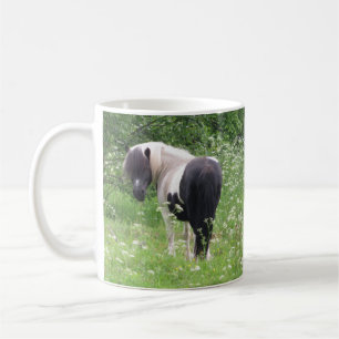 Black and White Paint Pony in Grass and Flowers Coffee Mug