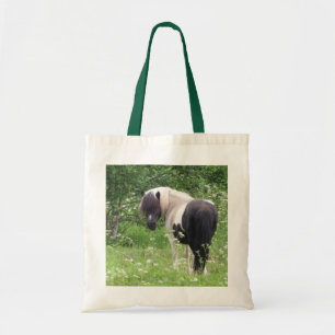Black and White Paint Pony in Grass and Flowers Tote Bag