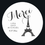 Black and White Paris Eiffel Tower Wedding Merci Classic Round Sticker<br><div class="desc">These chic,  stylish stickers feature a black Eiffel Tower with a heart,  and the word "Merci" or thank you in French,  in fancy black script. The background is white but you can change the background to any colour.</div>