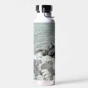 Black and White Photo of a Rocky Ocean Shore Water Bottle