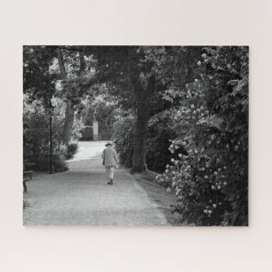 Black and white photo of old man at park jigsaw puzzle