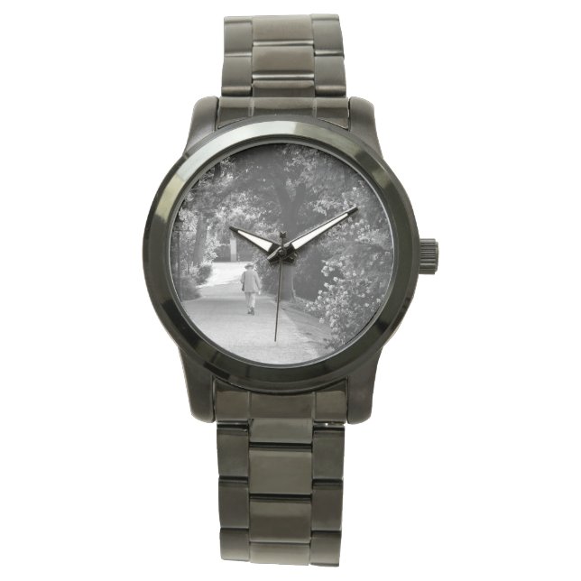 Black and white photo of old man at park watch (Front)