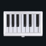 Black and White Piano Keys Business Card Holder<br><div class="desc">Black and White Piano Keys Business Card Holder. Close-up photo of piano keys. Customise this product by adding text! Visit www.zazzle.com/lsarmentoart for more unique products.</div>