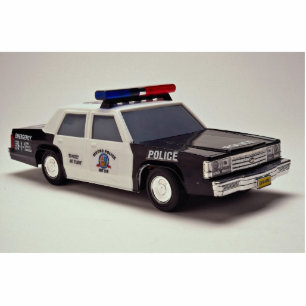 Black and white police car standing photo sculpture