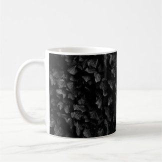 Black and white shot of thick ivy leaf plant coffee mug