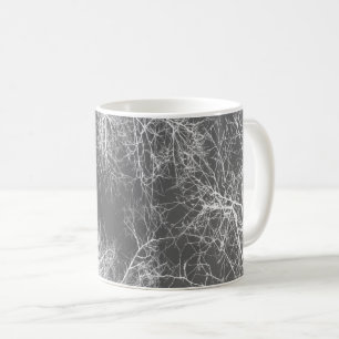 Black and white silhouetted trees coffee mug